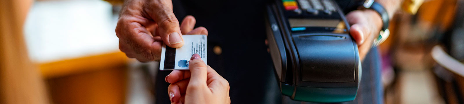 a person using a credit or debit card